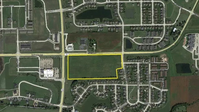 a bathroom with a mirror and a shower