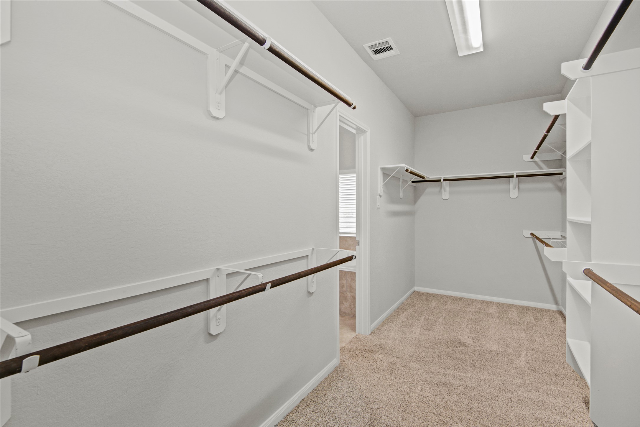 1314 Orchard Ridge Lane Tomball, TX 77375 - Photo 24 of 35 The generously sized walk-in closet provides ample storage with built-in hanging space.