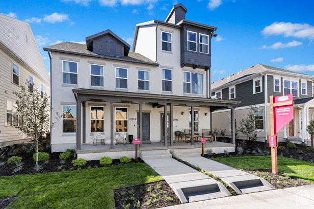 11722 Watercourse Road, Unit 372 South Jordan, UT 84009 - Photo 1 of 1 View of front of house featuring a porch and a front lawn