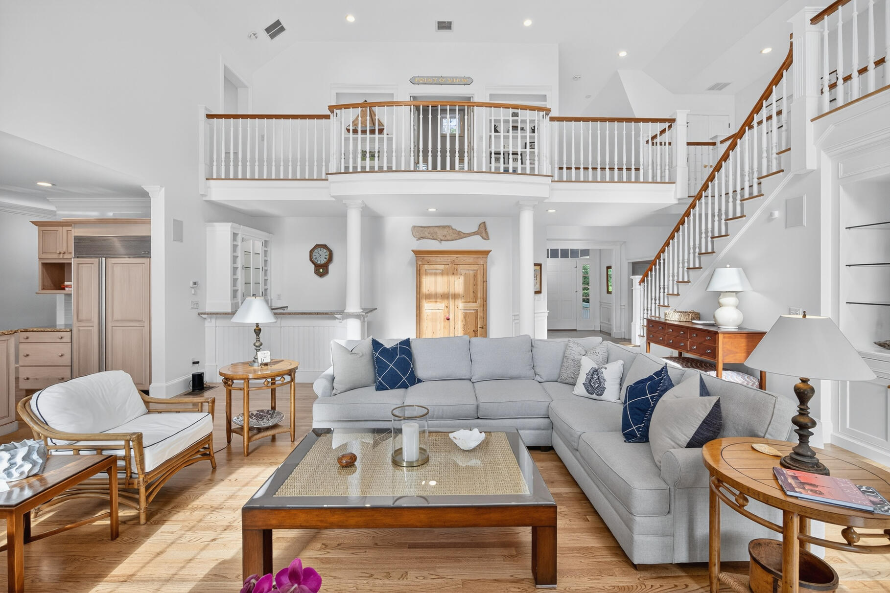 405 Bridge Street Osterville, MA 02655 - Photo 11 of 57 a living room with furniture or couch and a dining table