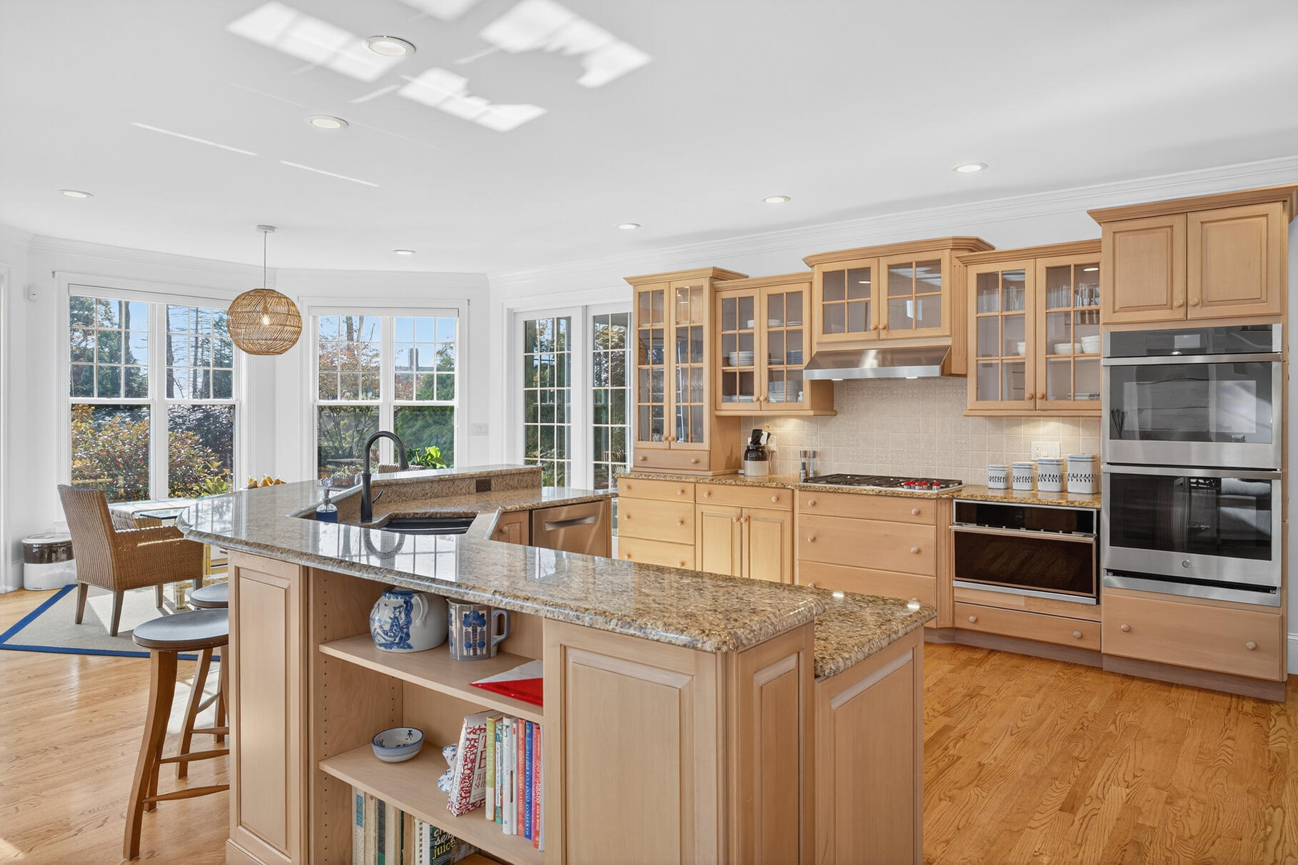 405 Bridge Street Osterville, MA 02655 - Photo 16 of 57 a kitchen with stainless steel appliances granite countertop a stove and a refrigerator