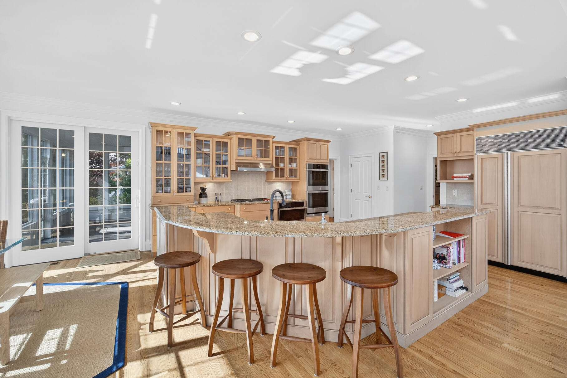 405 Bridge Street Osterville, MA 02655 - Photo 17 of 57 a dinning room filled with furniture and wooden floor