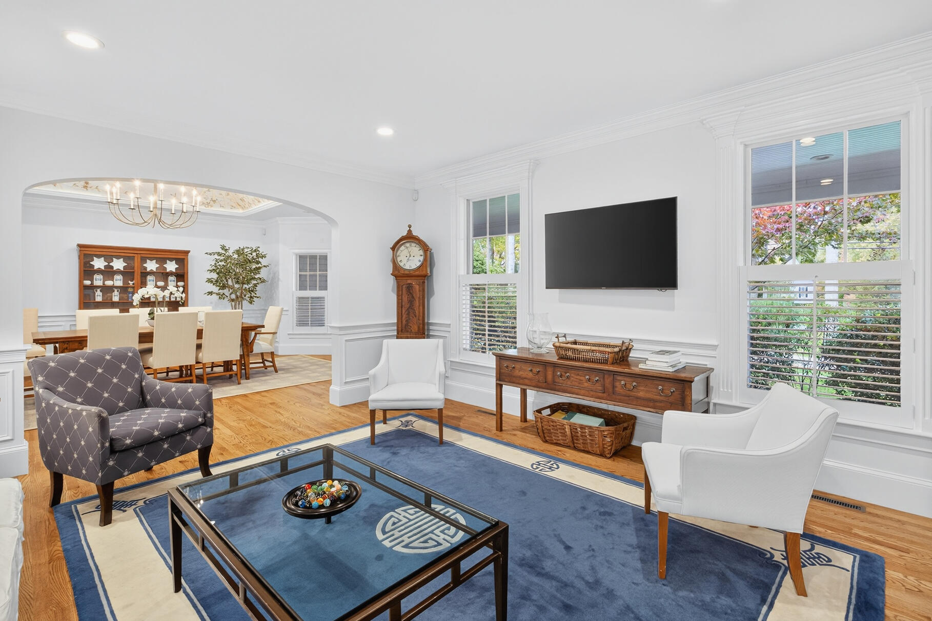 405 Bridge Street Osterville, MA 02655 - Photo 19 of 57 a living room with furniture a flat screen tv and a large window
