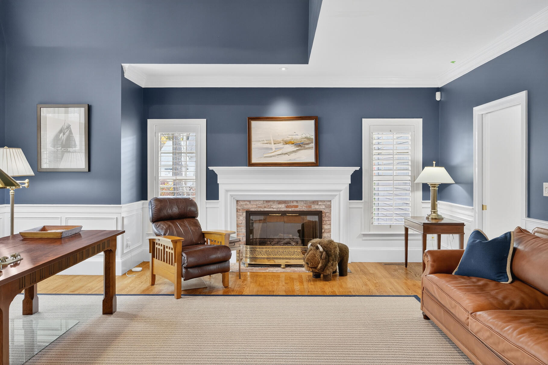 405 Bridge Street Osterville, MA 02655 - Photo 27 of 57 a living room with furniture and a fireplace
