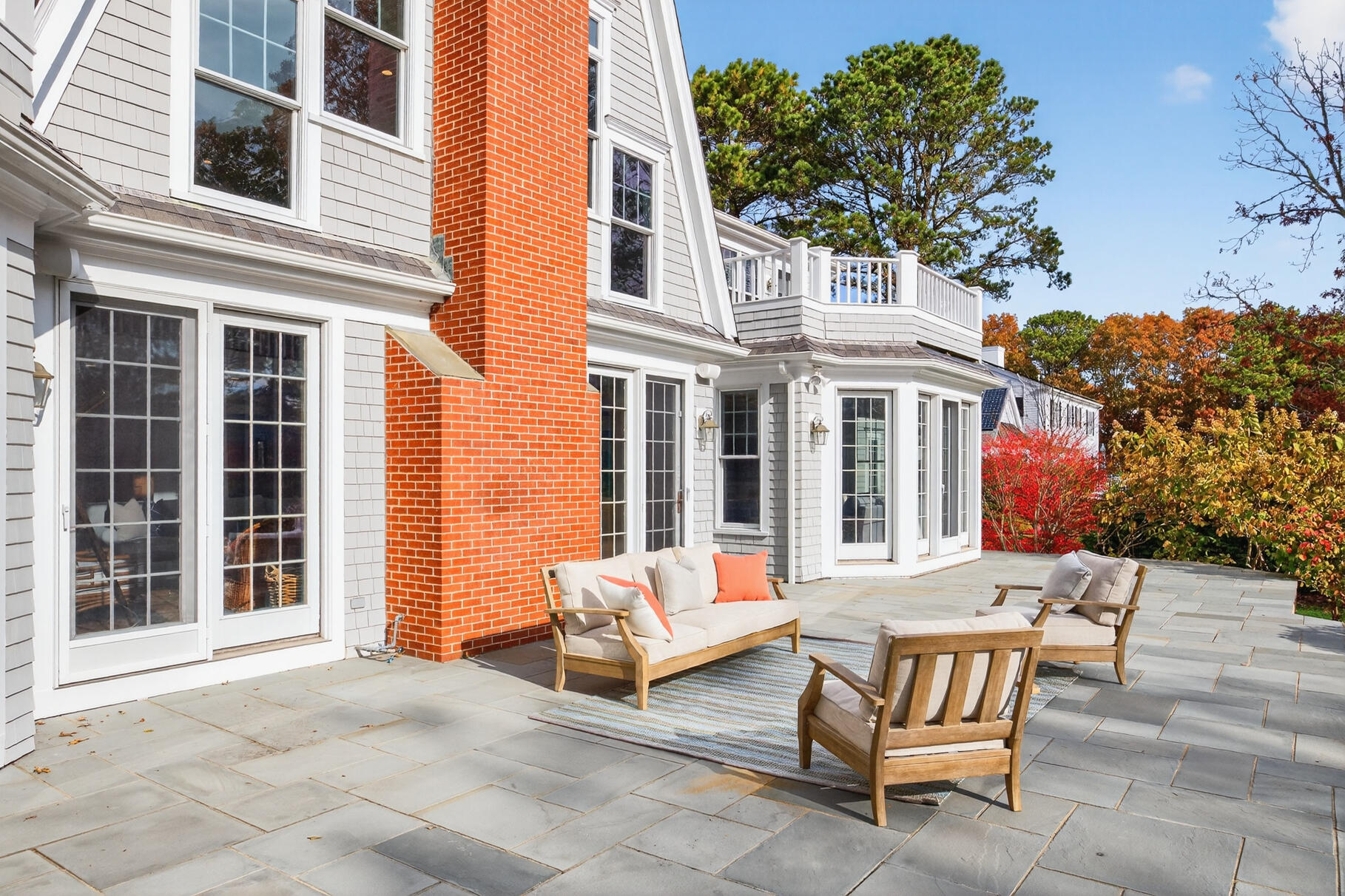 405 Bridge Street Osterville, MA 02655 - Photo 30 of 57 a building outdoor space with patio furniture and potted plants