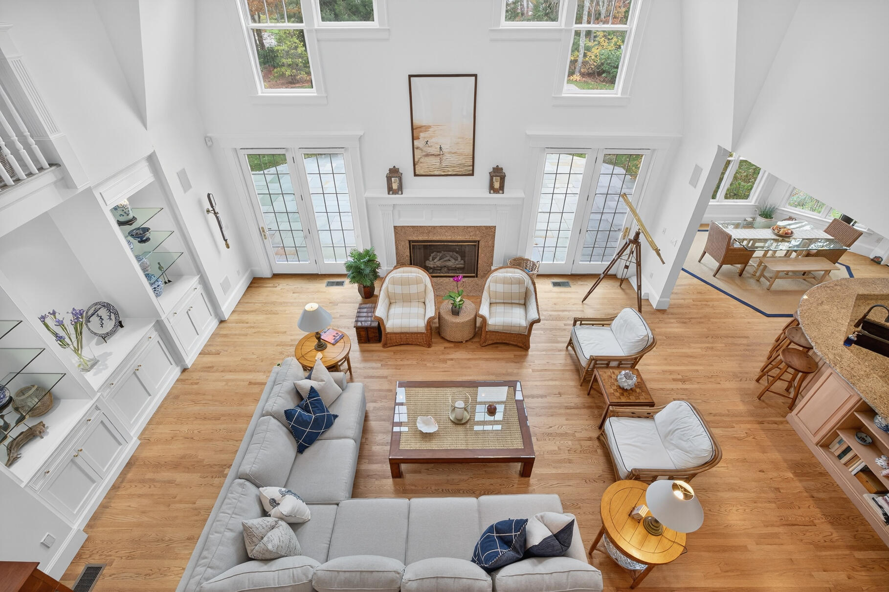 405 Bridge Street Osterville, MA 02655 - Photo 41 of 57 a living room with furniture and a fireplace