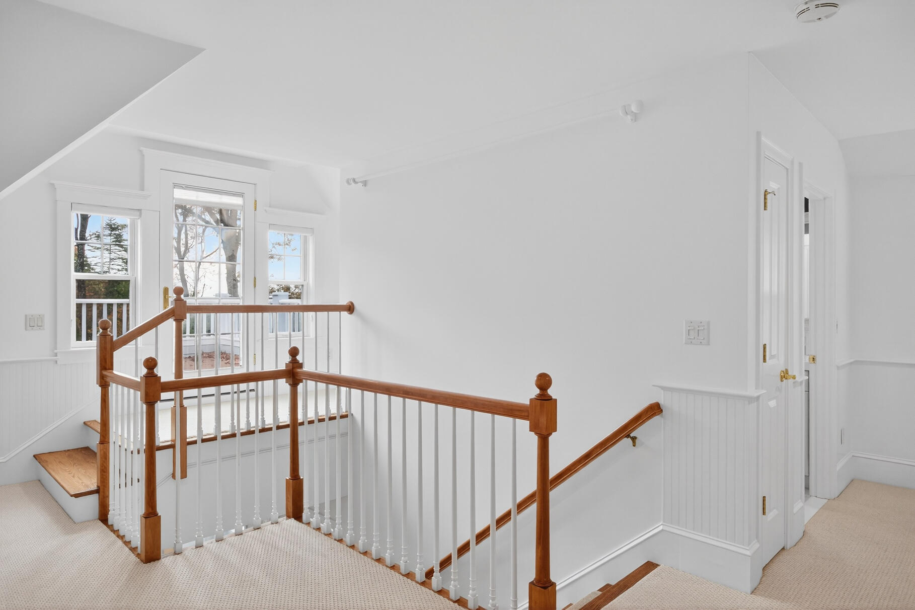 405 Bridge Street Osterville, MA 02655 - Photo 42 of 57 a view of staircase with white walls and a window