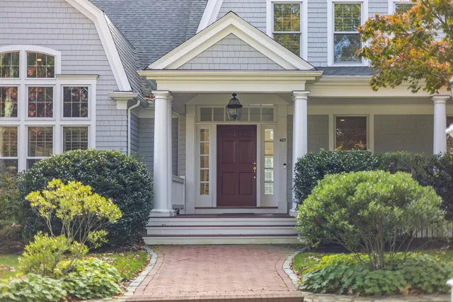 a view of a chair and table in the balcony