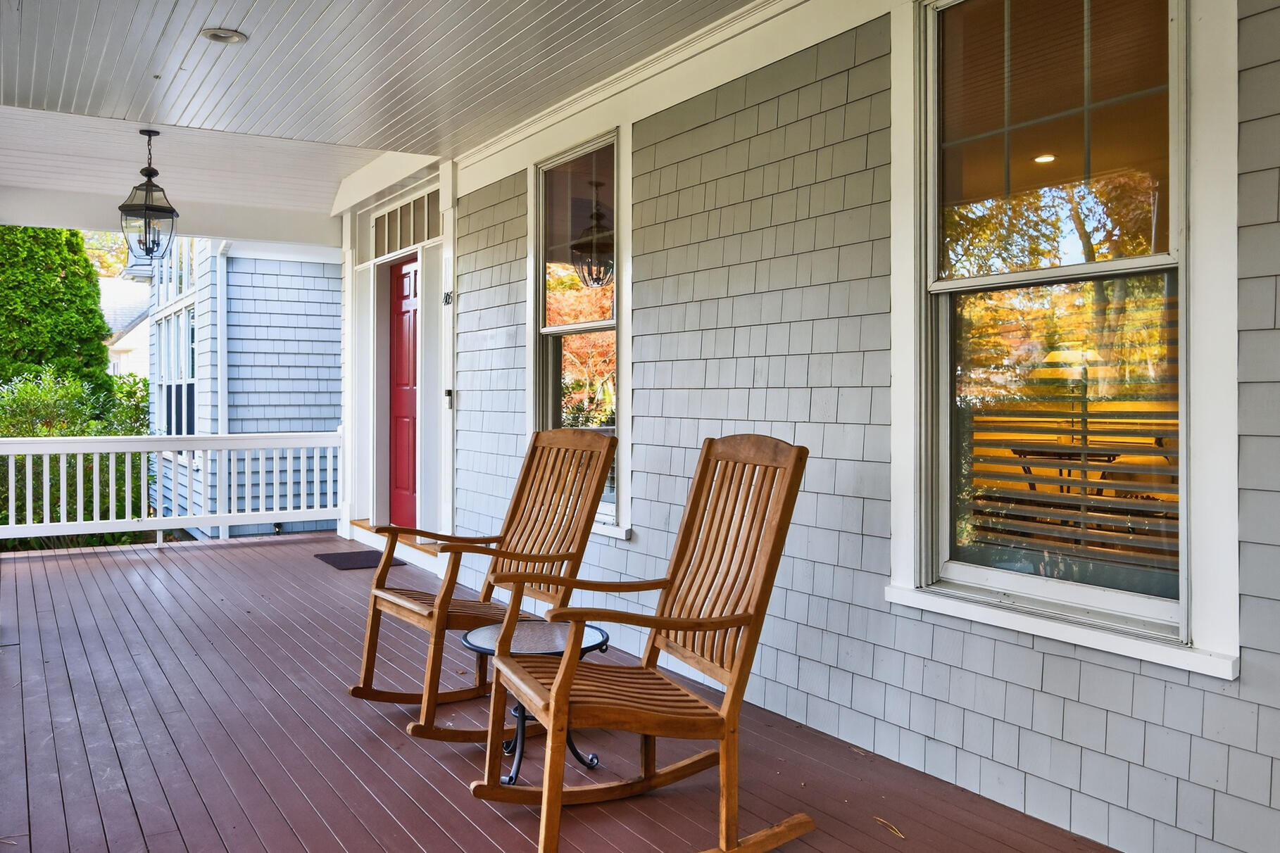 405 Bridge Street Osterville, MA 02655 - Photo 7 of 57 a view of a chair and table in the balcony
