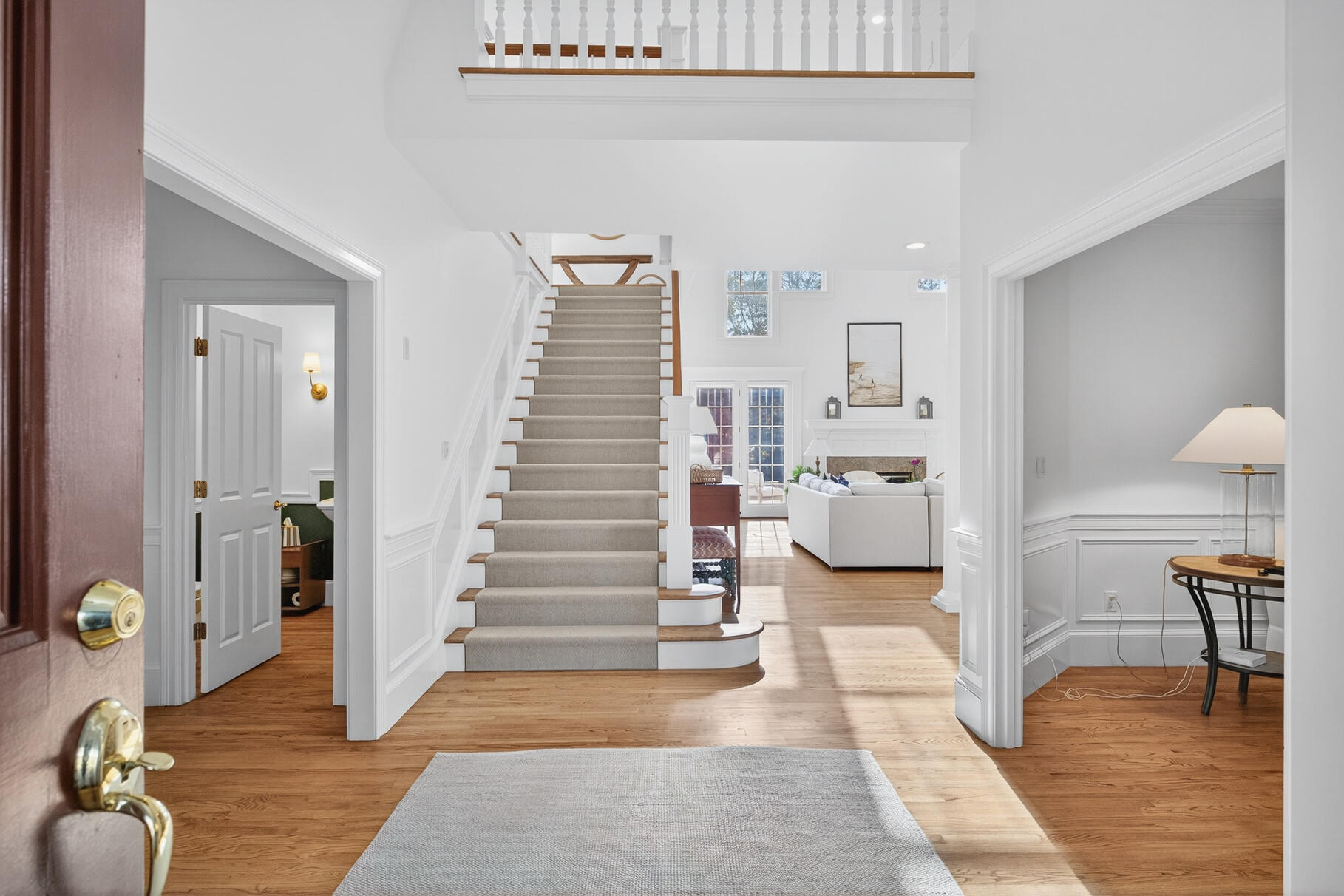 405 Bridge Street Osterville, MA 02655 - Photo 8 of 57 a view of entryway and hall with wooden floor