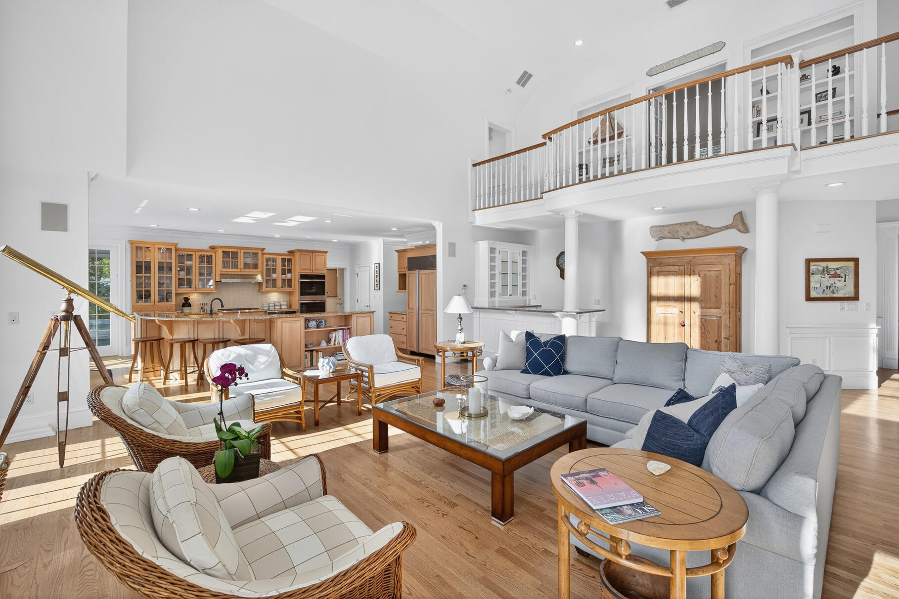 405 Bridge Street Osterville, MA 02655 - Photo 10 of 57 a living room with furniture a rug and a bookshelf