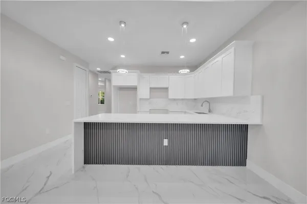a bathroom with a shower and a toilet