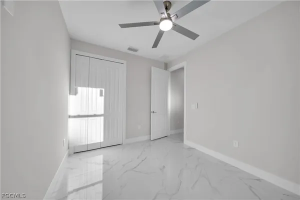 a room with a white furniture