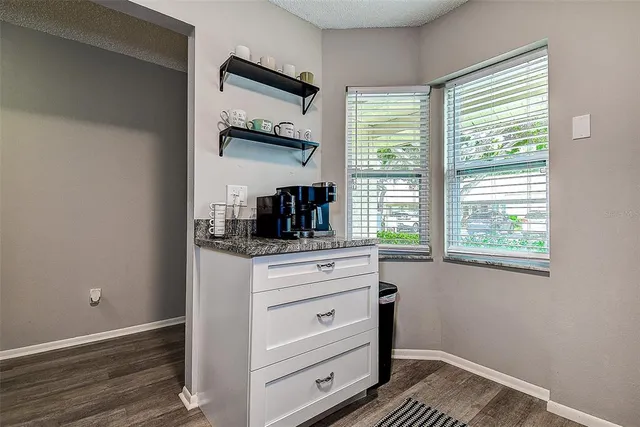 a kitchen with a window and a sink