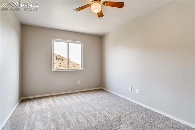 7545 Julynn Road Colorado Springs, CO 80919 - Photo 14 of 29 Bedroom #2 (window is being replaced)