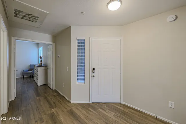 a view of a room that has a bench in it