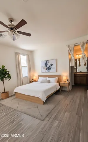 a bedroom with a bed and a window