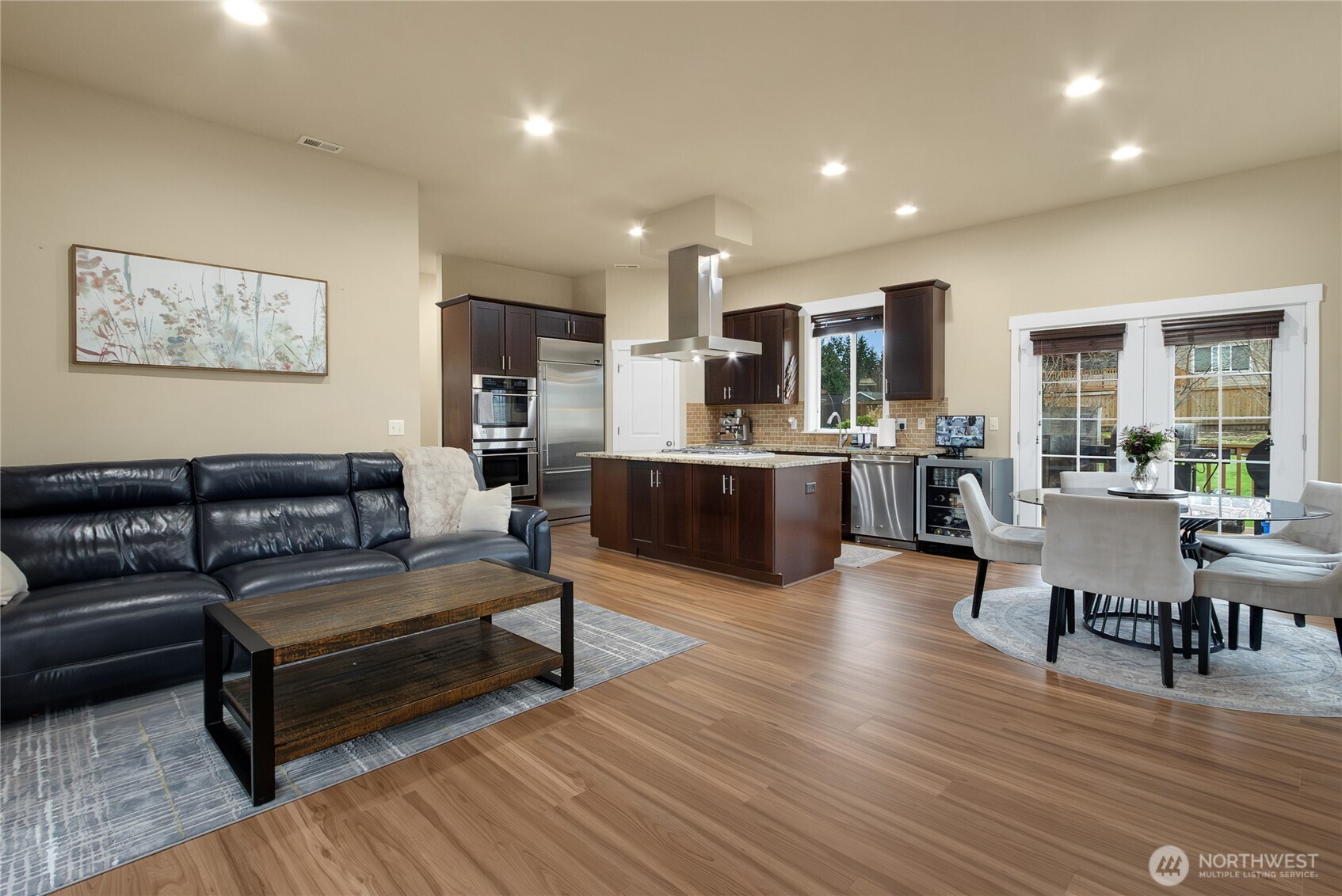 889 Lund Street Buckley, WA 98321 - Photo 7 of 25 a living room with stainless steel appliances furniture and a wooden floor