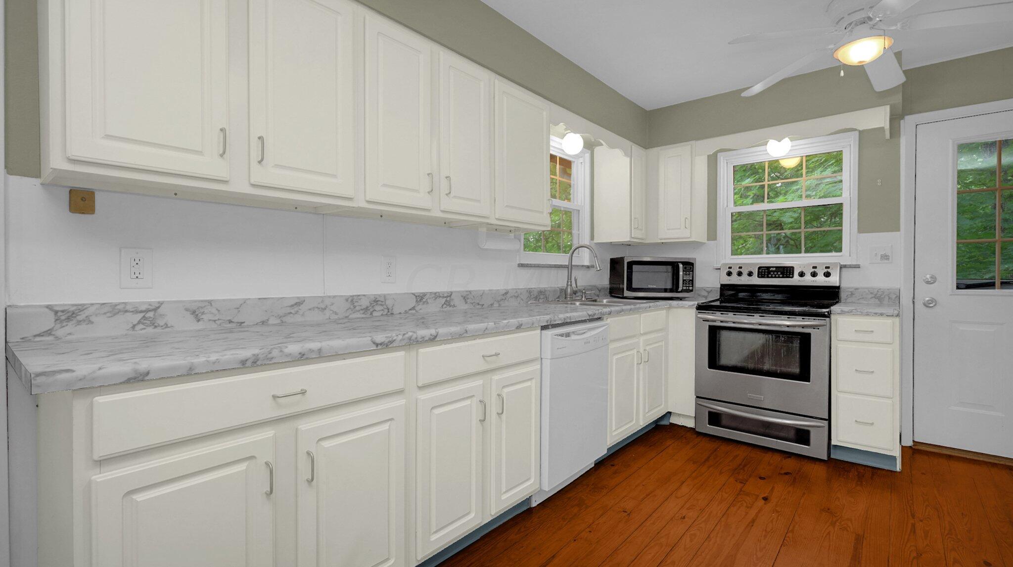 29234 Hide Away Hills Lane Logan, OH 43138 - Photo 10 of 48 Cabinets and countertop for food prep