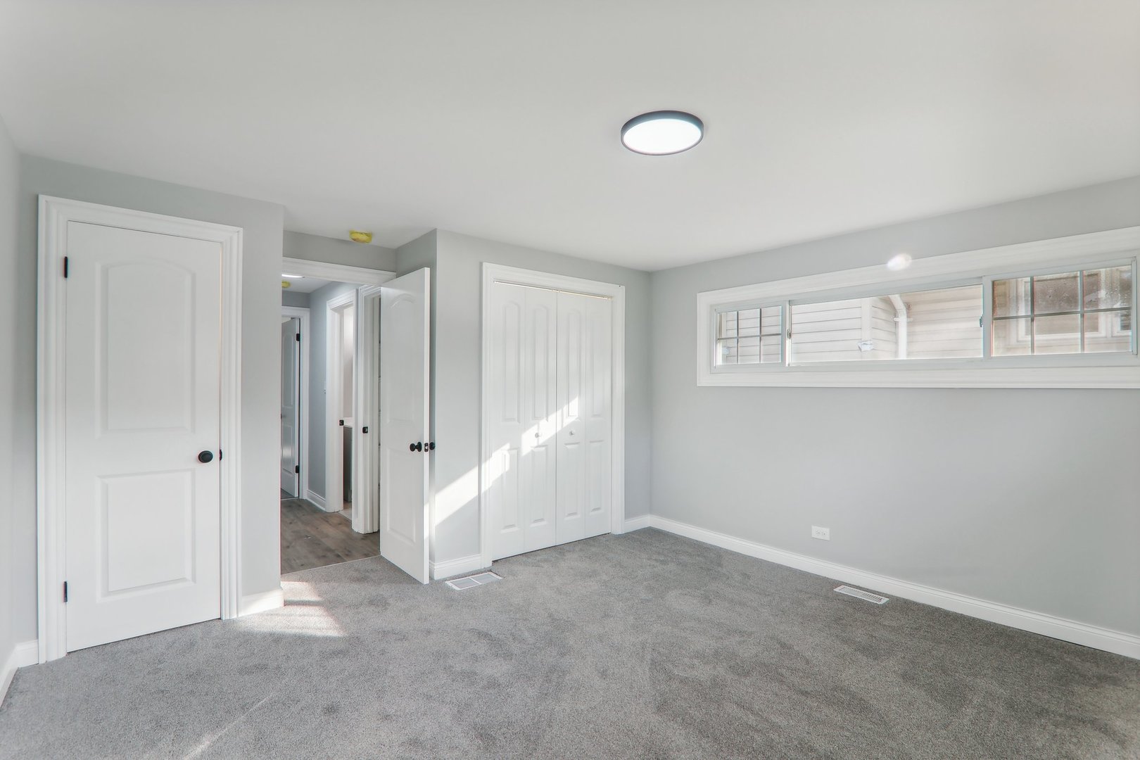 3120 173rd Street Hazel Crest, IL 60429 - Photo 15 of 24 a view of an empty room with a window
