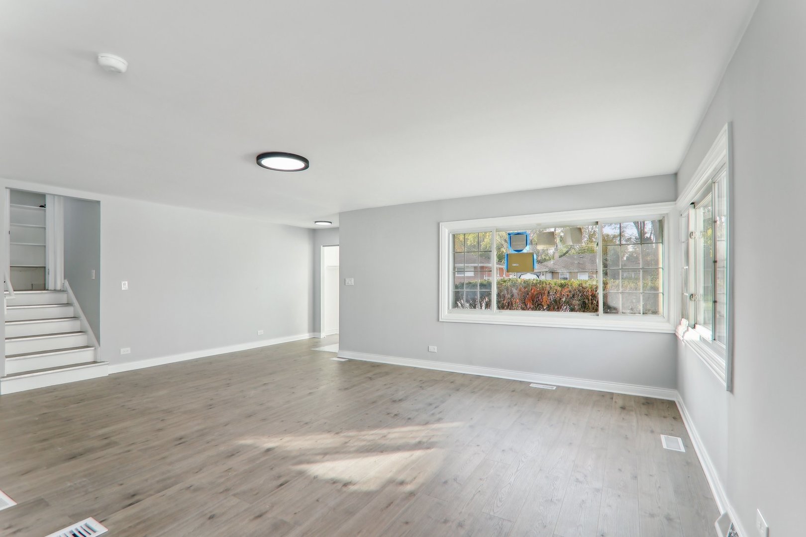 3120 173rd Street Hazel Crest, IL 60429 - Photo 6 of 24 a view of an empty room with a window
