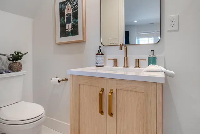 a view of a chairs and table in the balcony