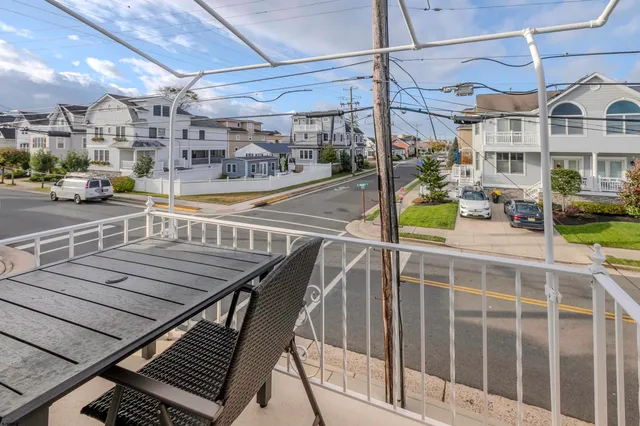 a view of a balcony with car