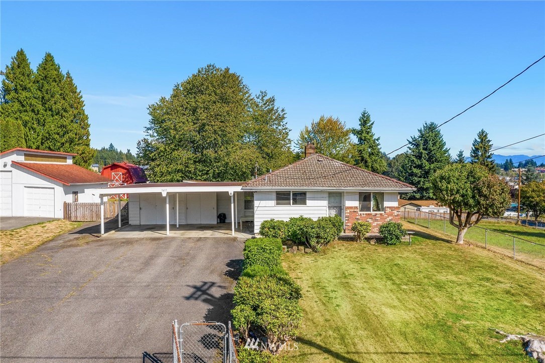 1617 Ludwig Road Snohomish, WA 98290 - Photo 3 of 31 a front view of a house with a yard