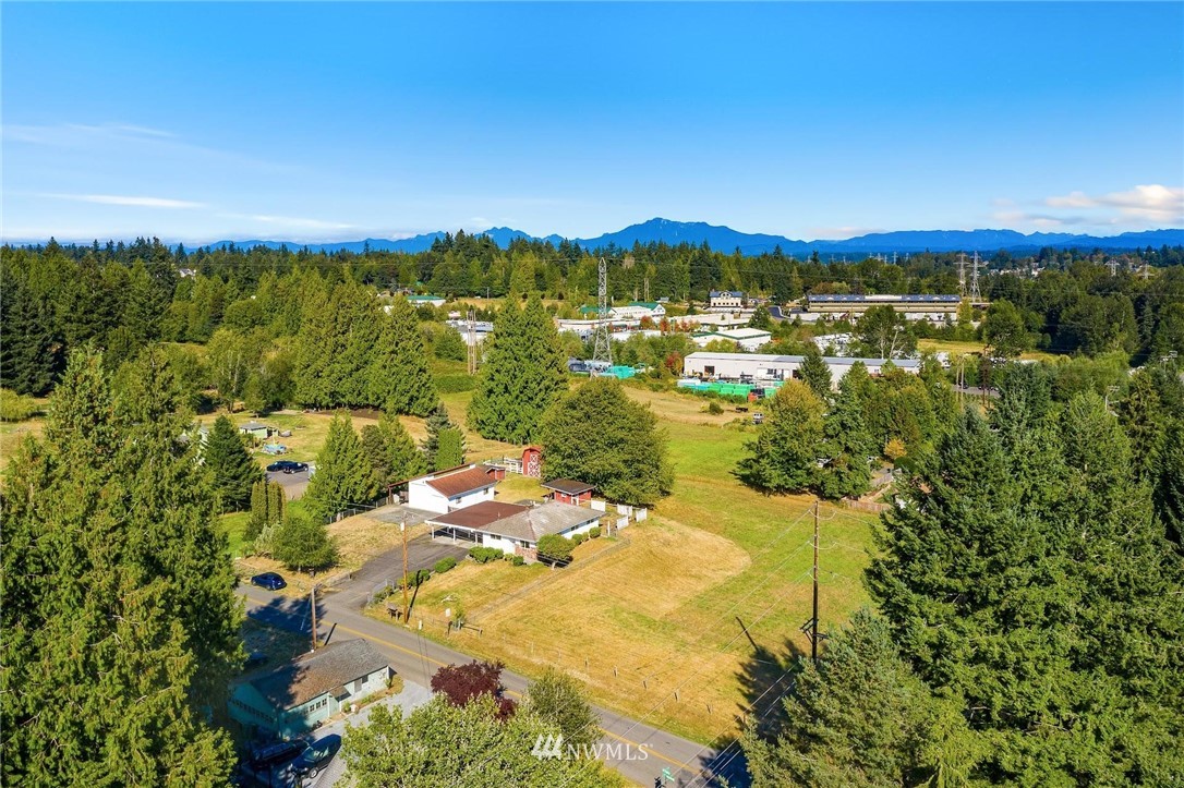 1617 Ludwig Road Snohomish, WA 98290 - Photo 27 of 31 a view of a lake with houses in the back