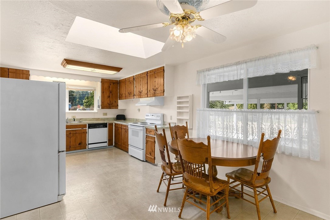 1617 Ludwig Road Snohomish, WA 98290 - Photo 10 of 31 a view of a dining room with furniture window and outside view