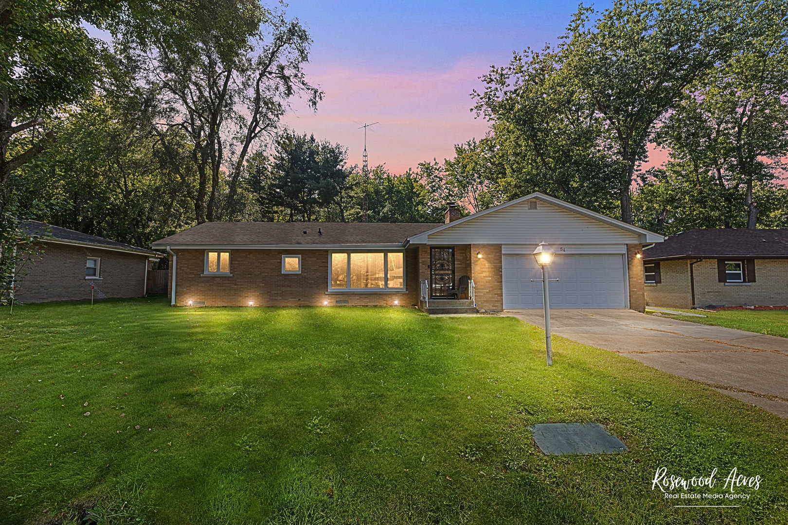 54 Cherry Drive Kankakee, IL 60901 - Photo 1 of 1 a front view of a house with a yard