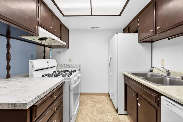 a front view of a house with a glass door