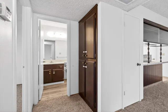 an empty room with a empty space and windows