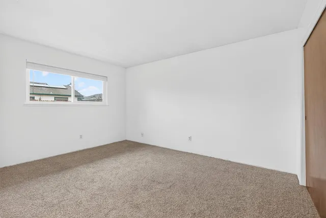 a view of a back yard of the house