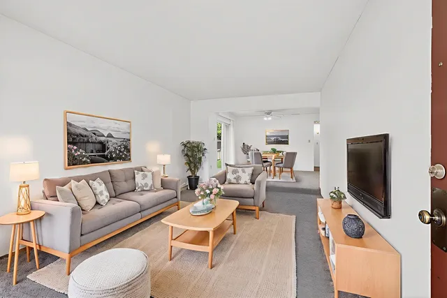 a kitchen with a stove and a refrigerator