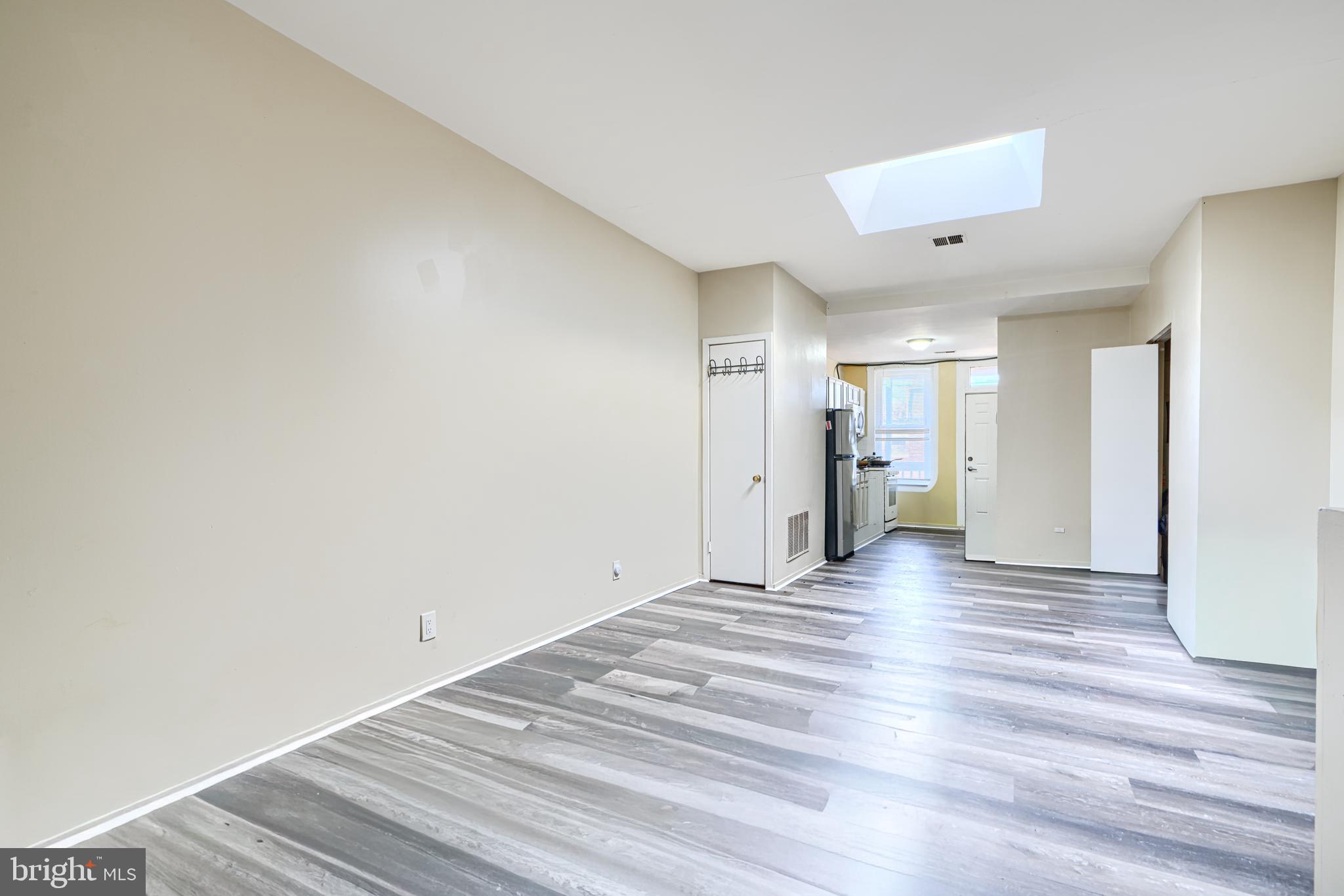 3218 Belair Road Baltimore, MD 21213 - Photo 11 of 26 a view of a livingroom with wooden floor