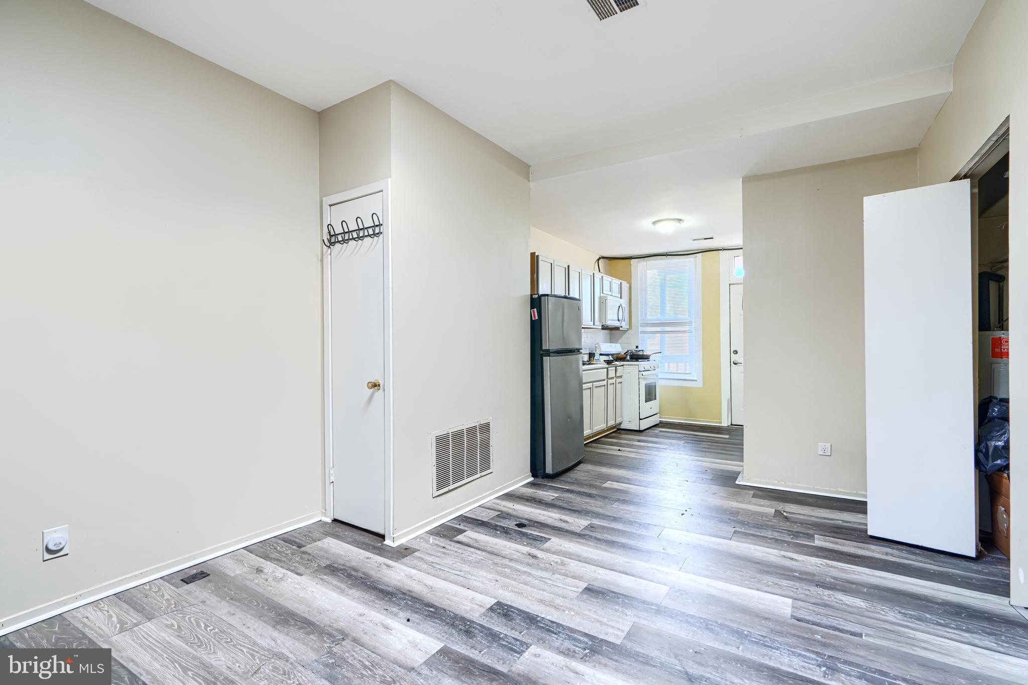 3218 Belair Road Baltimore, MD 21213 - Photo 12 of 26 a view of a kitchen with wooden floor