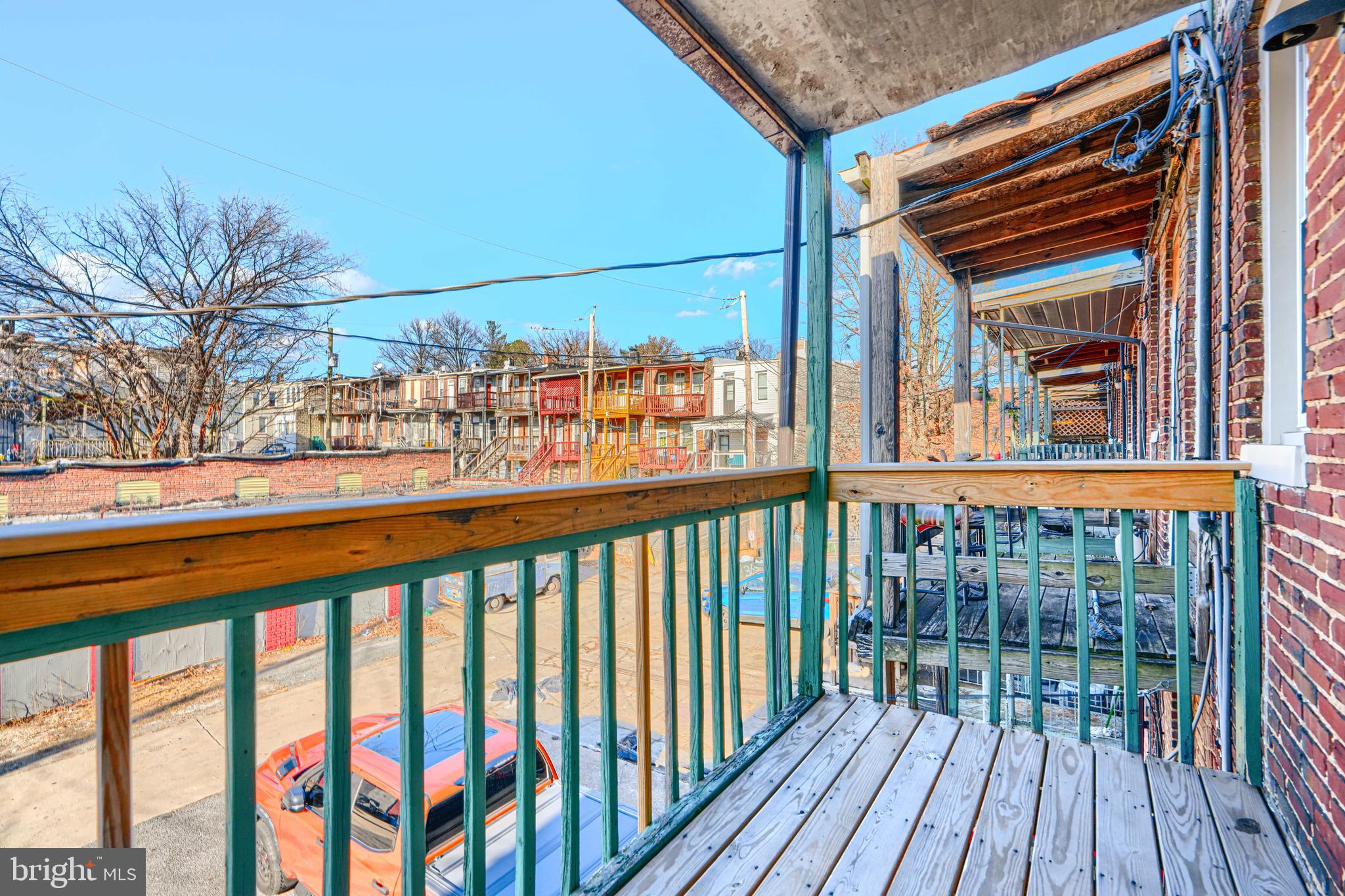 3218 Belair Road Baltimore, MD 21213 - Photo 19 of 26 a view of a balcony with wooden floor