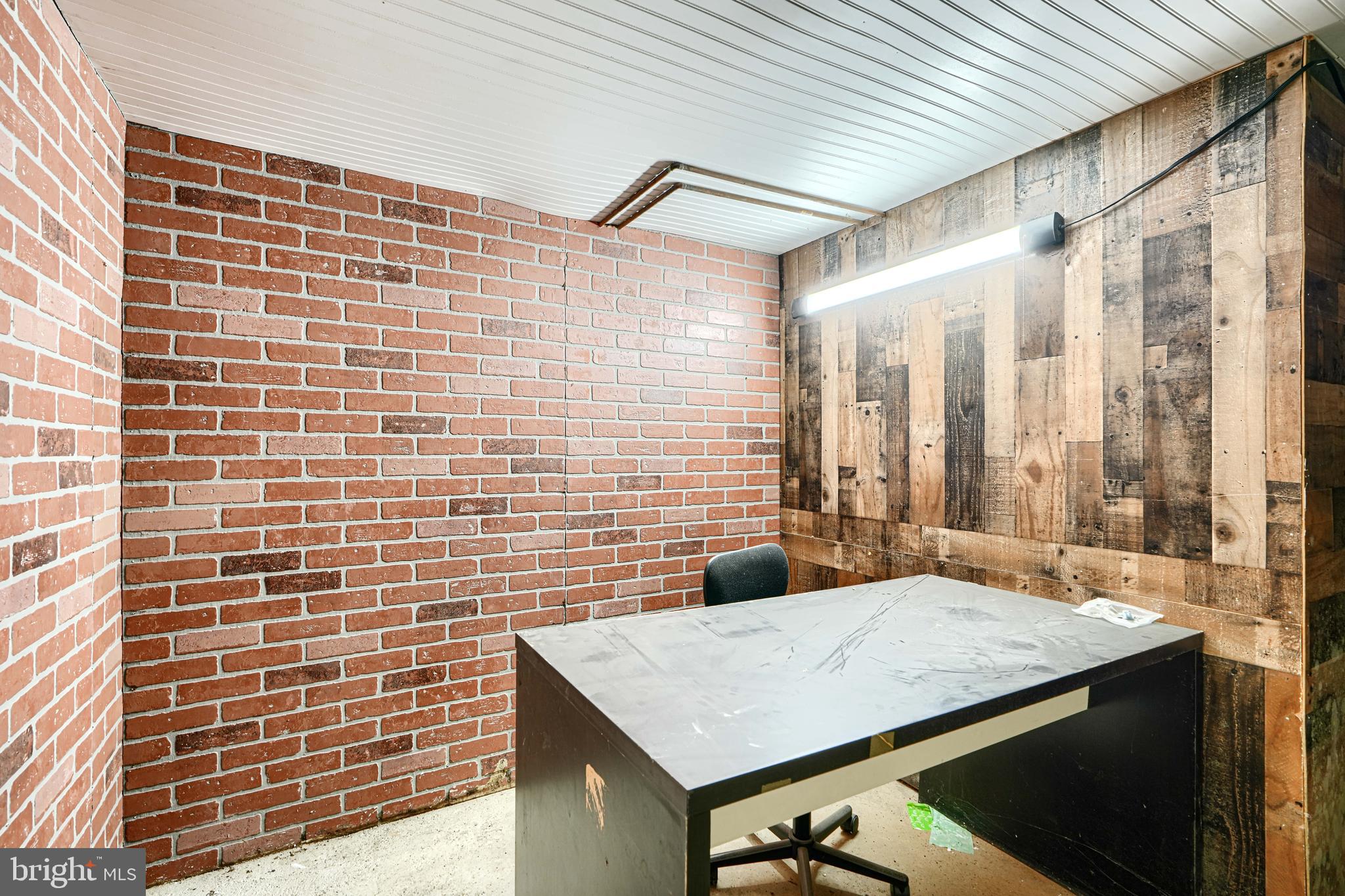 3218 Belair Road Baltimore, MD 21213 - Photo 22 of 26 a bathroom with a granite countertop sink and a shower