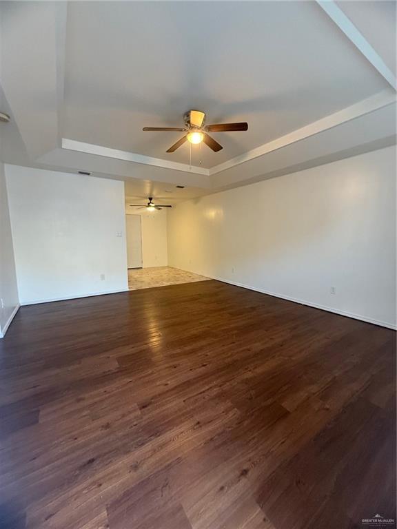1914 Summer Breeze Road, Unit D Mission, TX 78572 - Photo 2 of 10 a view of empty room with wooden floor