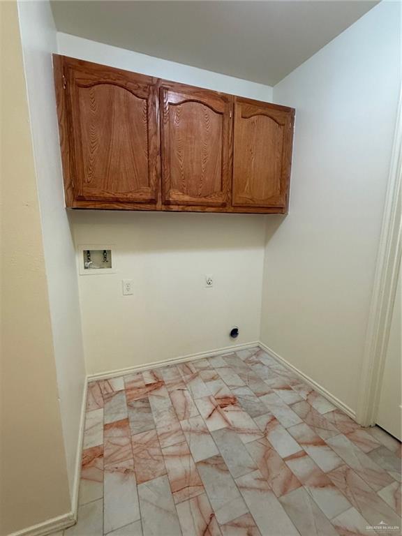 1914 Summer Breeze Road, Unit D Mission, TX 78572 - Photo 10 of 10 a view of a utility room with wooden floor