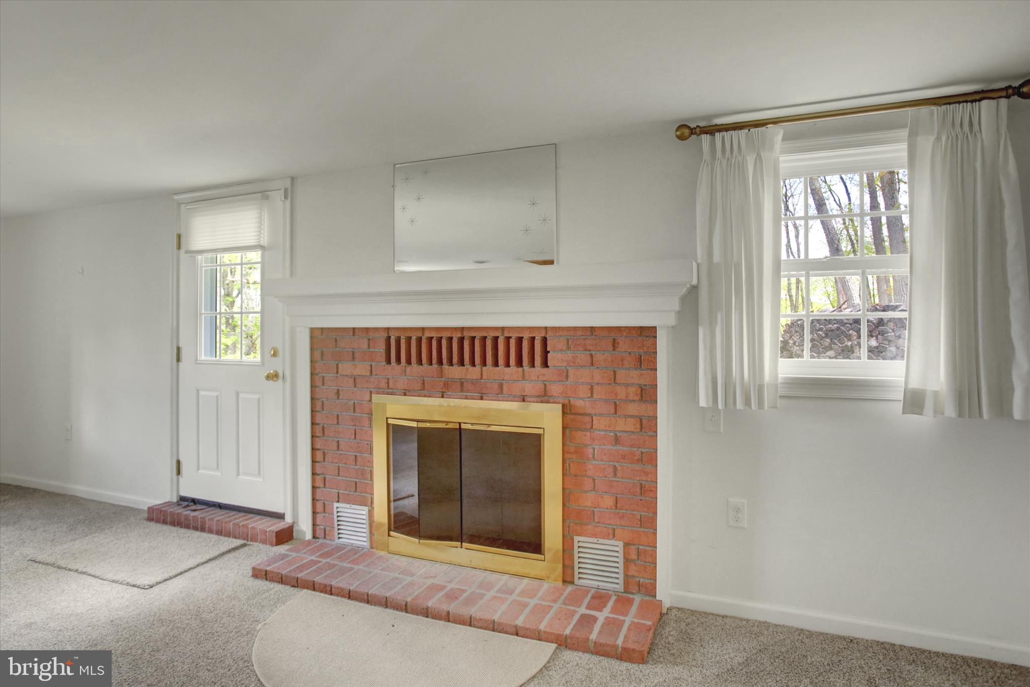 232 Mt Union Road Fayetteville, PA 17222 - Photo 9 of 39 Main floor family room wood burning fireplace