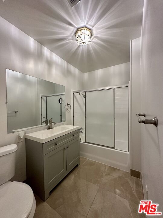 Undisclosed Address Azusa, CA 91702 - Photo 11 of 31 a bathroom with a toilet sink and mirror