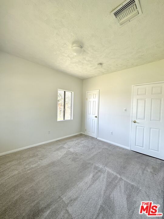 Undisclosed Address Azusa, CA 91702 - Photo 15 of 31 a view of an empty room and window