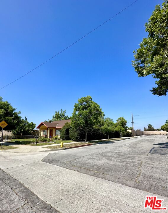 Undisclosed Address Azusa, CA 91702 - Photo 2 of 31 a view of street with houses