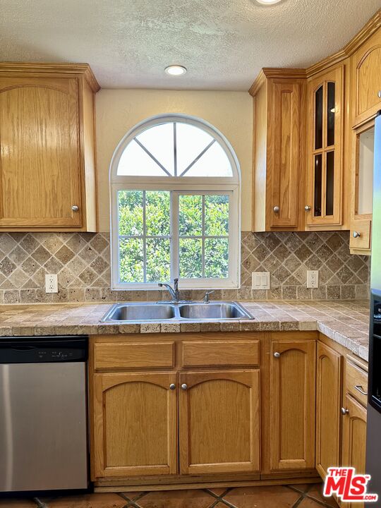 Undisclosed Address Azusa, CA 91702 - Photo 22 of 31 a kitchen with granite countertop a sink and cabinets