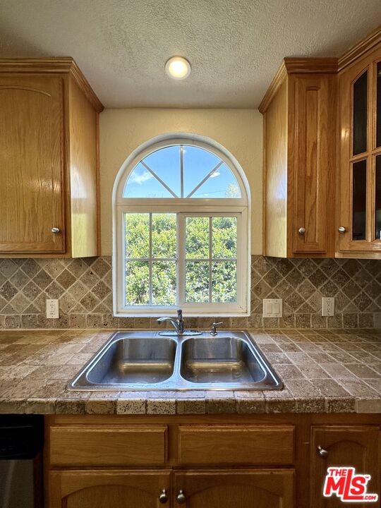 Undisclosed Address Azusa, CA 91702 - Photo 23 of 31 a kitchen that has a sink and a stove