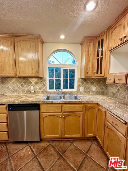 Undisclosed Address Azusa, CA 91702 - Photo 24 of 31 a kitchen with granite countertop a sink and cabinets