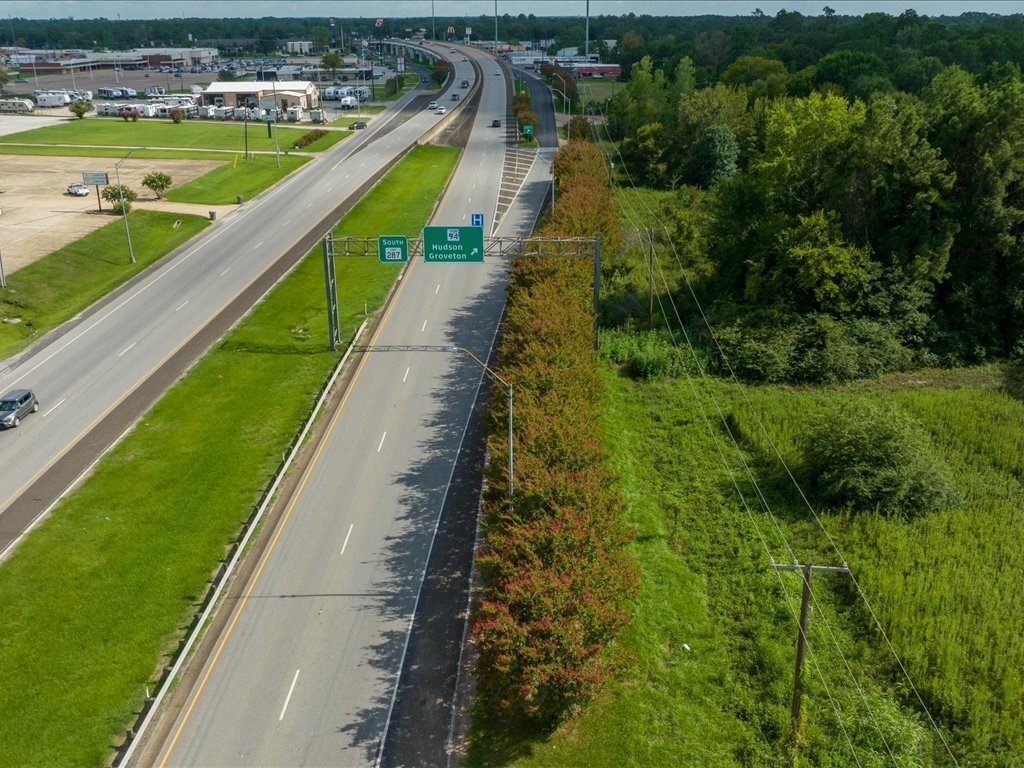 601 North John Redditt Drive Lufkin, TX 75904 - Photo 8 of 13 a view of a yard with a swimming pool