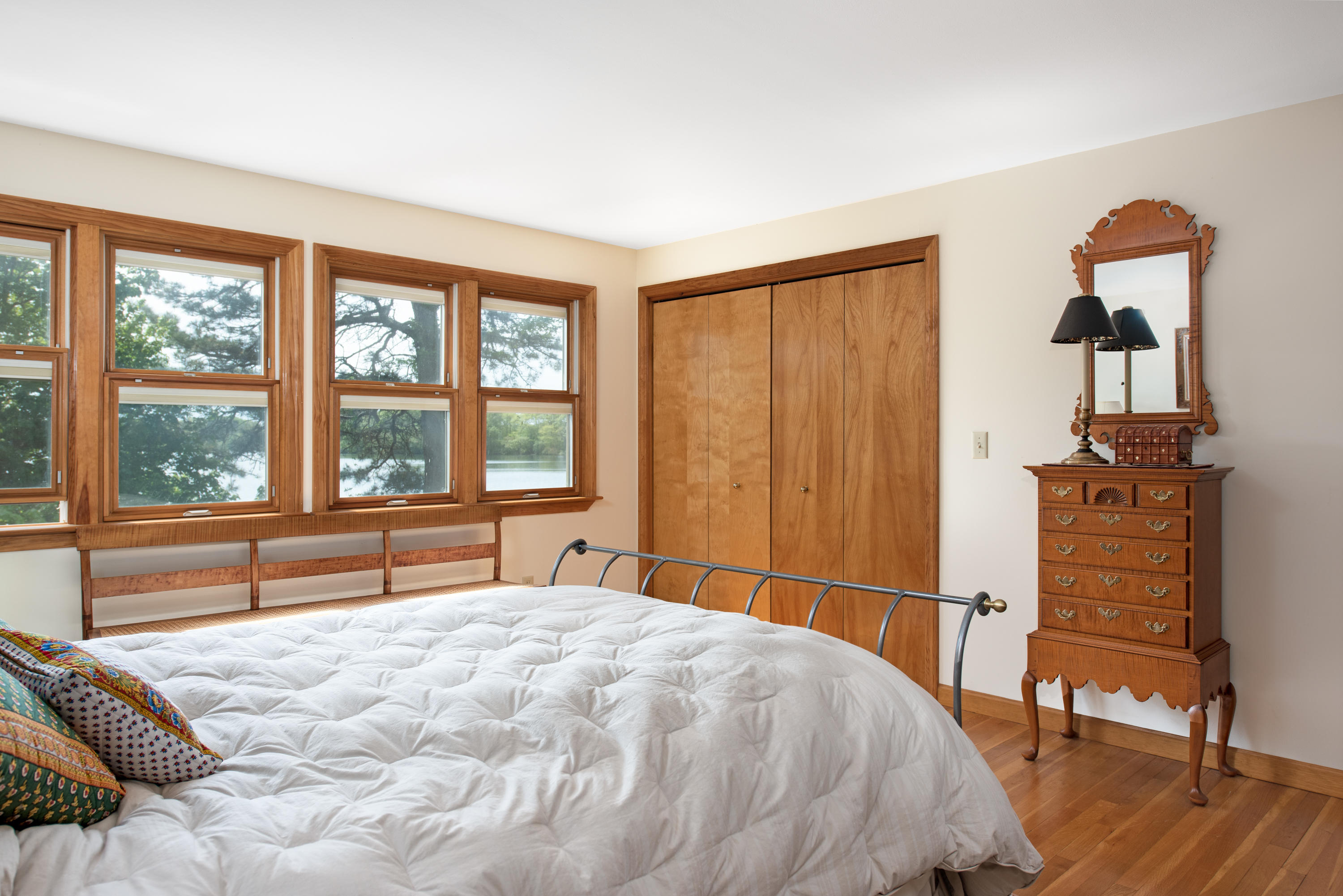 326 Holly Point Road Centerville, MA 02632 - Photo 12 of 30 a bed sitting in a bedroom next to a window